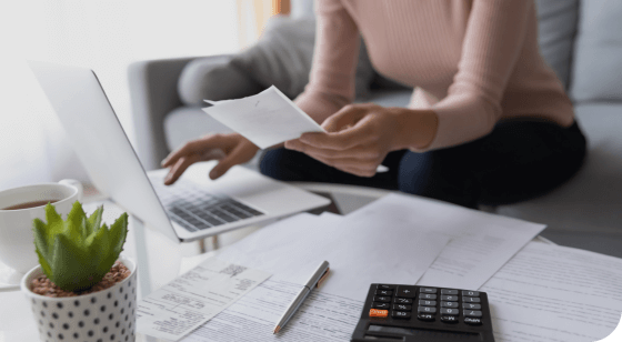 Transparency image homeowner working on her finances at her home