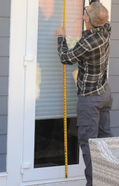 Rick Martin outside home measuring dimensions Energy View