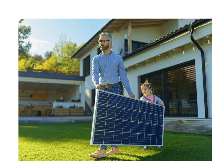 Homeowner and daughter holding solar panels Energy View